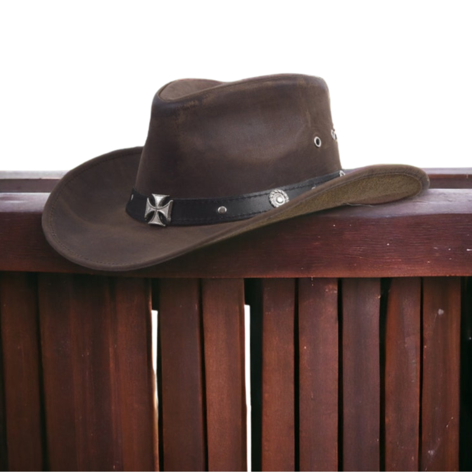 Brown leather cowboy hat with wide brim and iron cross band.
