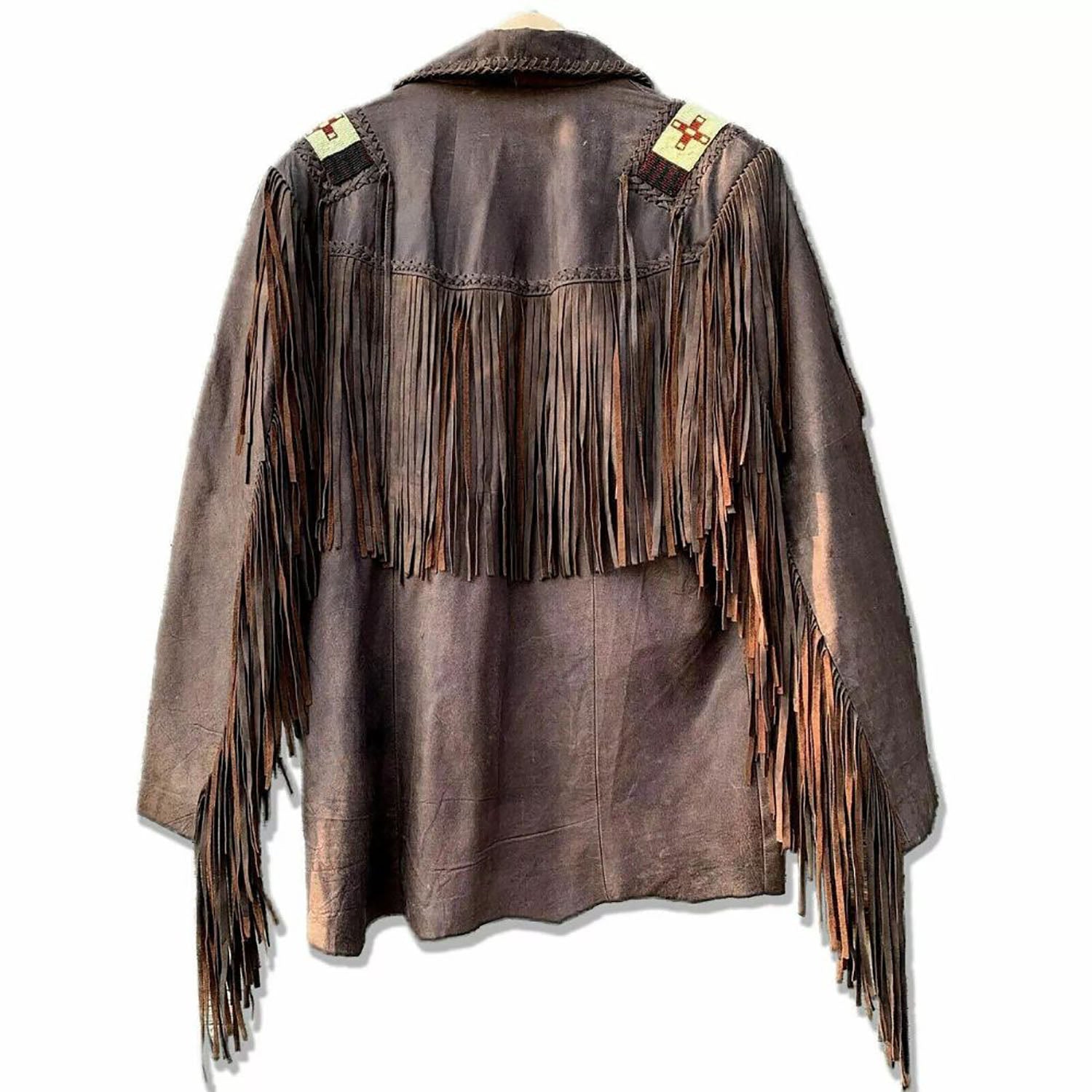 The dark brown leather fringe jacket with beaded detailing, pictured from the side