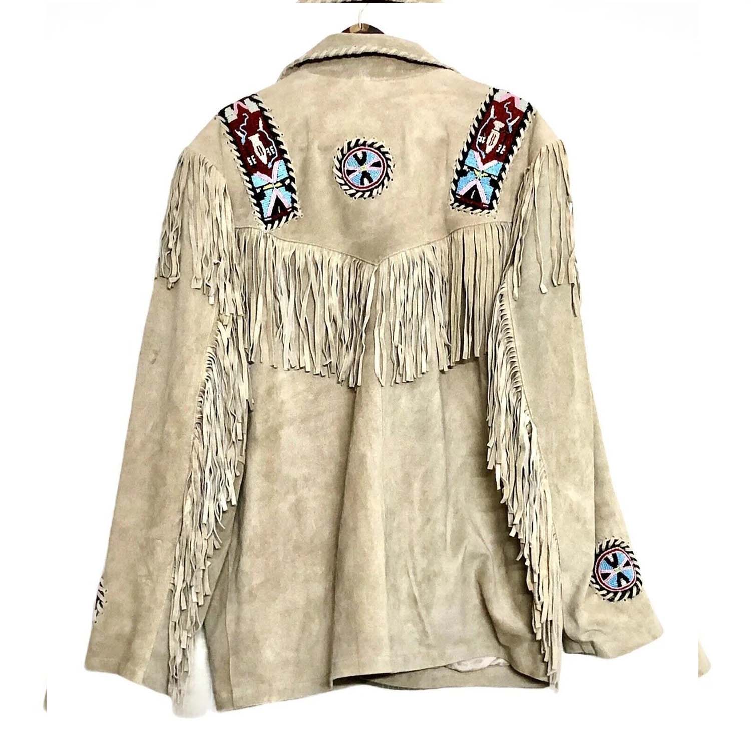 Side profile showing the beige suede leather fringe jacket with native american design