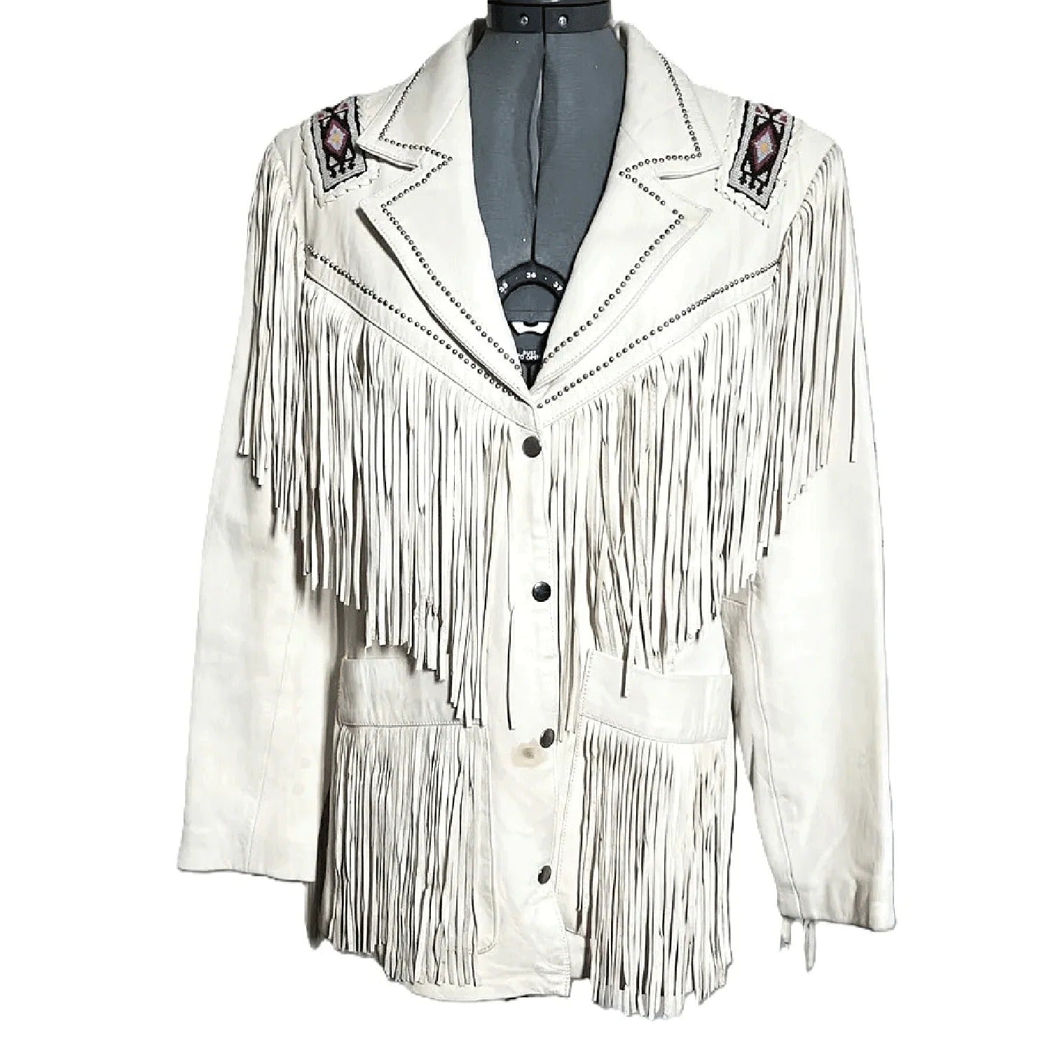The white leather fringe jacket, pictured from the front