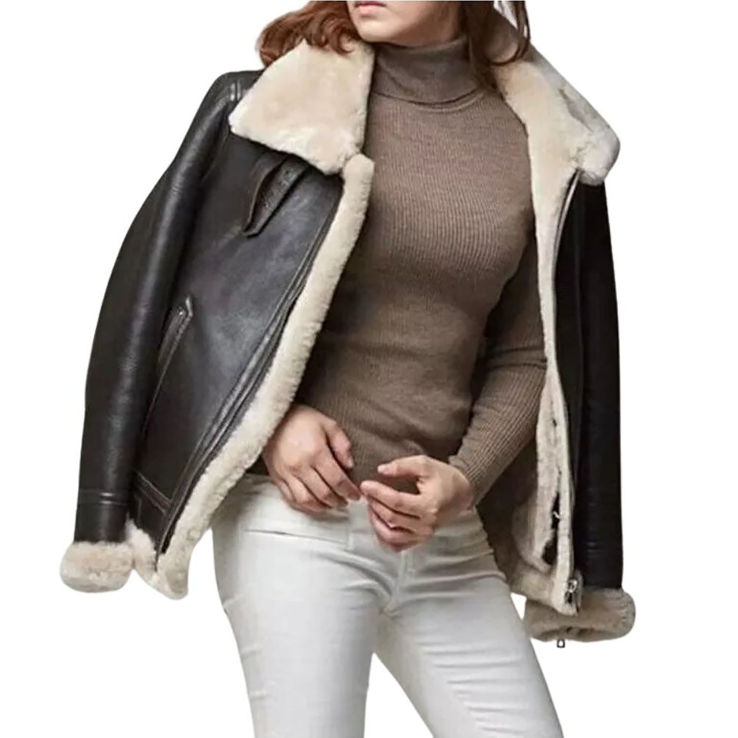 Person wearing a black leather jacket with white fur lining, brown turtleneck sweater, and white pants on a white background.