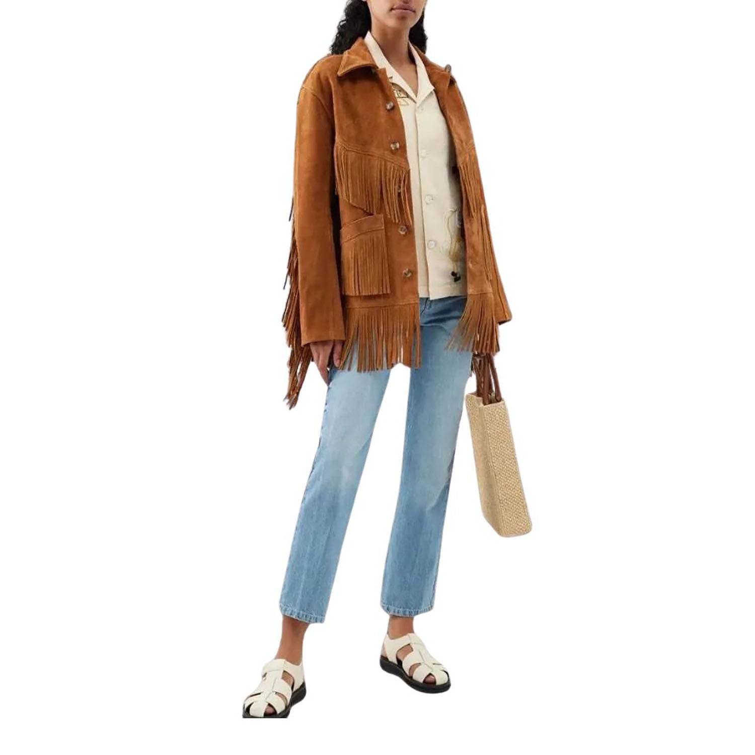 Person wearing a brown fringed jacket, light blue jeans, and sandals on a white background